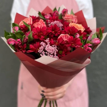 Author's bouquet of red spray Chrysanthemums and coral Roses